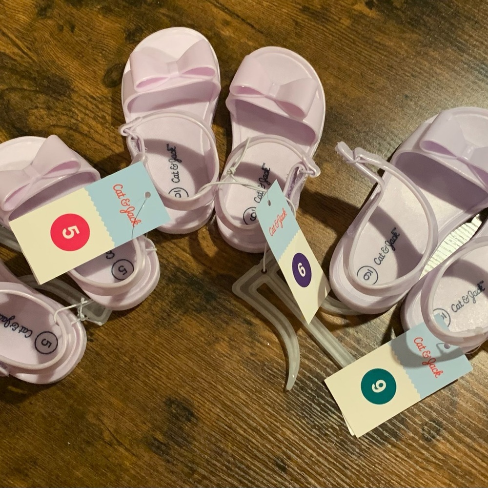 Buy 1 get one 50% off kids shoes
Cat & Jack Kids' Light Purple Sandals